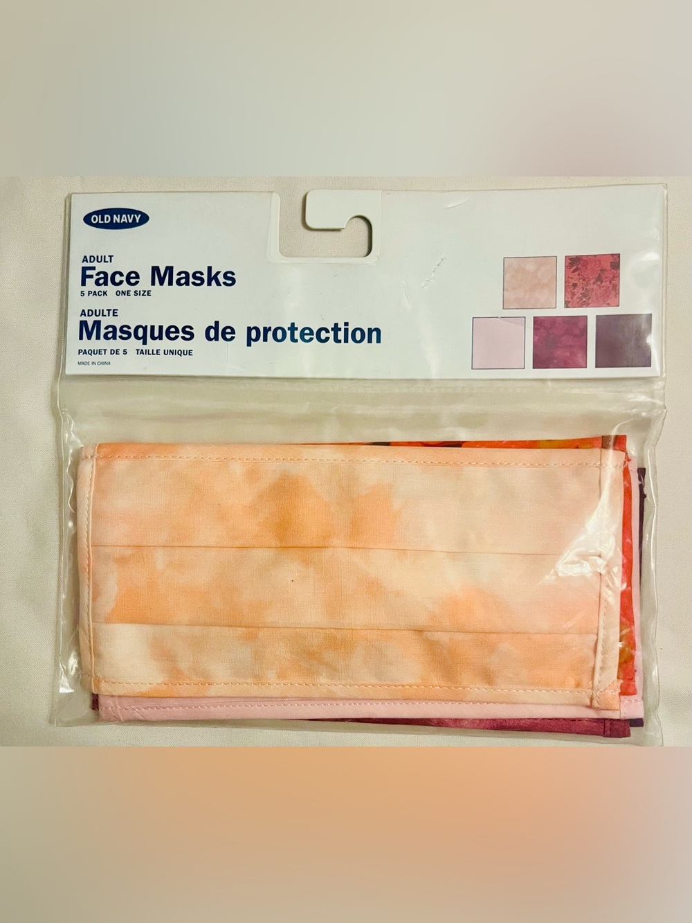 Old Navy (NEW IN ORIGINAL PACKAGING) Peach Tie-Dye Adult Face Masks.